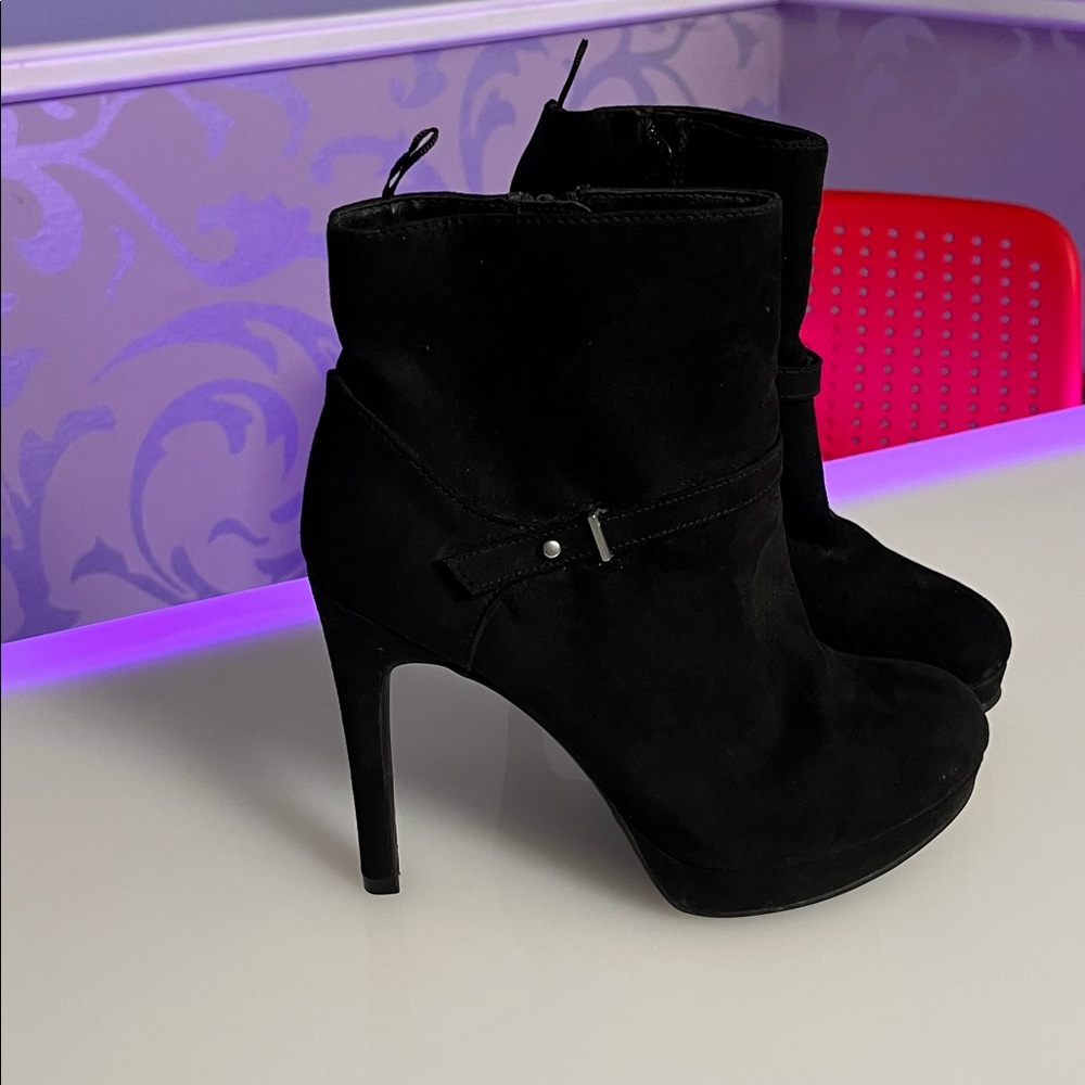 Black suede bootie heels.